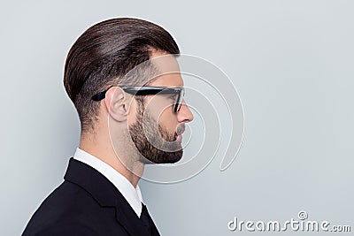 Half-faced profile side view close up portrait of serious focused handsome attractive style stylish modern masculine guy with Stock Photo