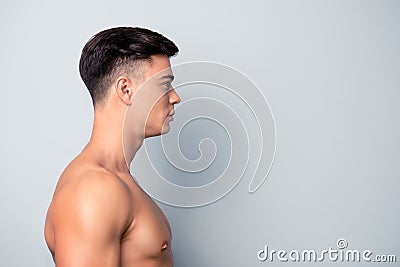 Half-faced profile side view portrait of confident shaven w Stock Photo
