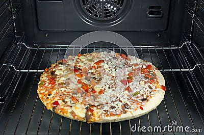 Half frozen pizza Stock Photo