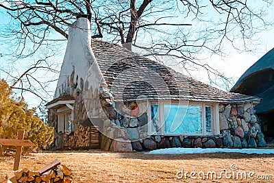 A view of the Half House, an Earl Young Mushroom House in Charlevoix Michigan Editorial Stock Photo