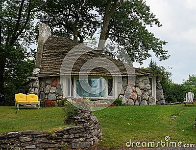 The Half House, famous mushroom house designed by Earl Young, in Charlevoix, Michigan Editorial Stock Photo