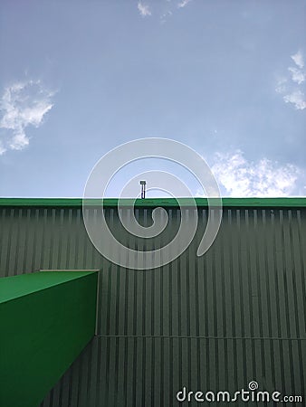 half house roof with half sky for background Stock Photo