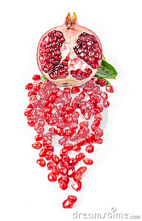 Half Juicy pomegranate with leaves. Stock Photo