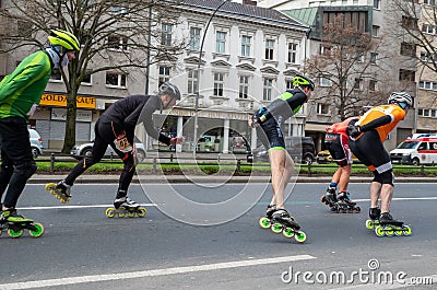 Half Marathon in Berlin. Race athletes on roller skates. Race through the city streets, Charlottenburg, Berlin Editorial Stock Photo