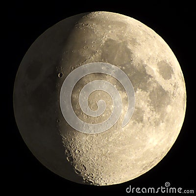 Half Moon with Craters. The Moon is an astronomical body that orbits planet Earth, being Earth`s only permanent natural satellite Stock Photo