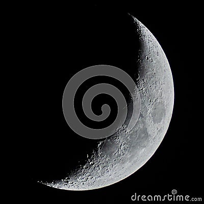 Half Moon details observing over telescope Stock Photo