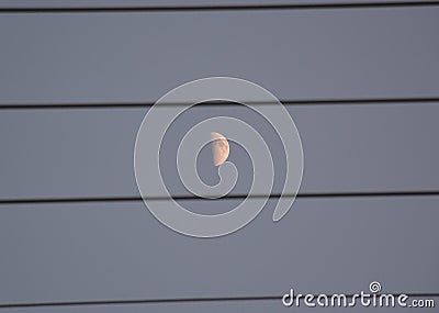 Half moon in the sky Stock Photo