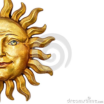 Half part of Golden sun face symbol with sunrays isolated on white. Wooden decor ornament symbol painted on gold paint. Summer wea Stock Photo