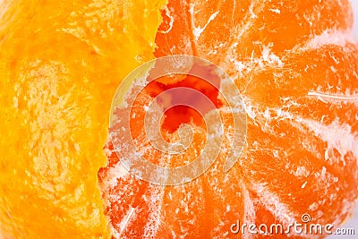 Half peeled mandarin. Stock Photo