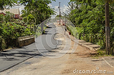 Half Road Repair With Asphaulted Concrete Stock Photo