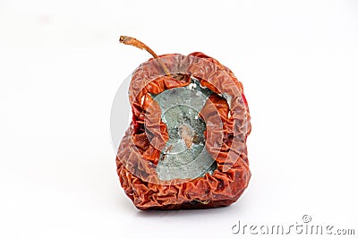 Half a rotten apple on white background Stock Photo