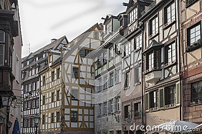 Half-timbered houses in one of the picturesque streets in the historical center of Nuremberg, Bavaria - Germany Editorial Stock Photo