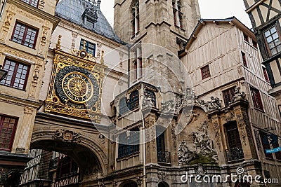 Half-timbered Houses at the street with the Great-Clock Gros-Horloge astronomical clock in Rouen, Normandy, France Editorial Stock Photo