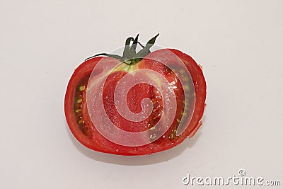 A half tomato in a white background Stock Photo