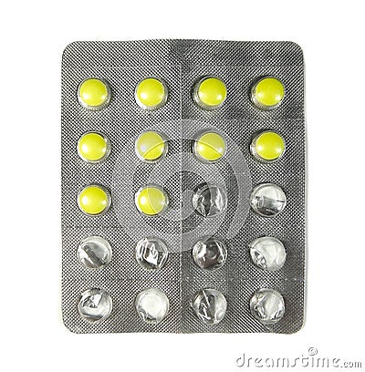 Half used pack of yellow pills isolated on white background. Stock Photo