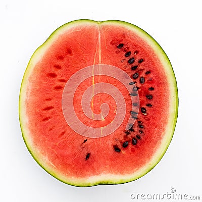Half watermelon with seeds isolated on white from above. Stock Photo