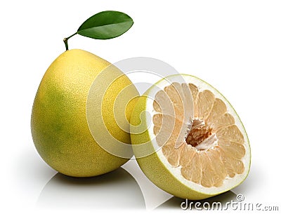 Half and whole pomelo fruits with leaf isolated Stock Photo