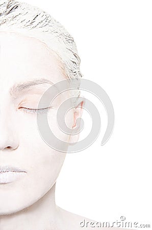 Half the women in white face make-up Stock Photo