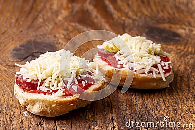 Halfs of a bun with cheese Stock Photo