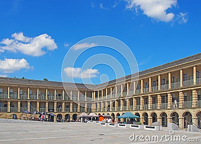 People sitting in cafes and shopping on the arcades at halifax piece hall in west yorkshire Editorial Stock Photo