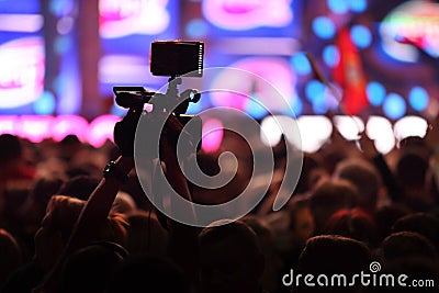 Hall with fans shoots video Stock Photo
