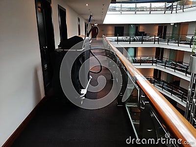 Hall of a luxury hotel in Moscow, a maid trolley stands next to the room Editorial Stock Photo