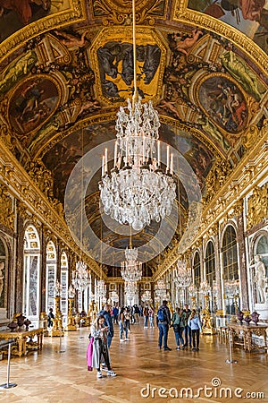 The Hall of Mirrors of the Chateau de Versailles (from the reign of Louis XIV) has 17 windows overlooking the gardens Editorial Stock Photo