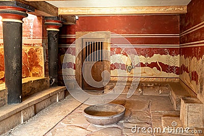The hall of the throne in the Minoan Palace of Knossos. Ancient ruines of famouse Knossos palace at Crete island. Greece Editorial Stock Photo
