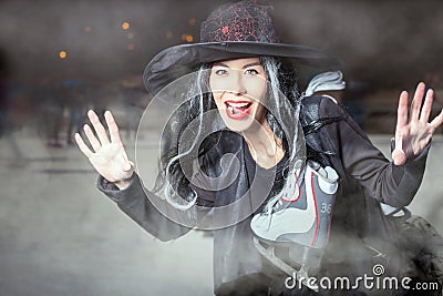 Halloween! Asian witch came to skate Stock Photo