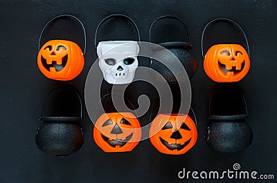 Halloween background with pattern of jack lanterns on black background. creative decoration, celebration, autumn Stock Photo