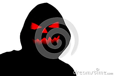 Halloween black hooded silhouette with a evil scary pumpkin face isolated on a white background Stock Photo