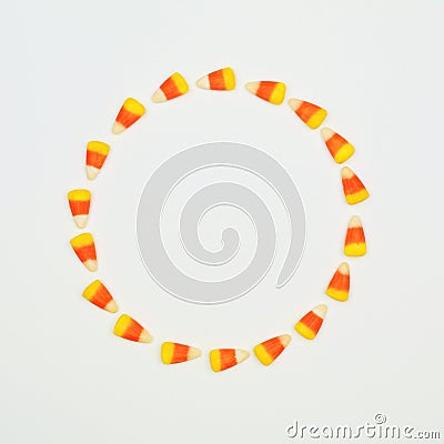 Halloween candy corn circle frame on a white background with copy space Stock Photo