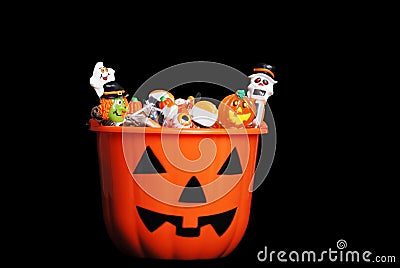 Halloween candy in pumpkin Stock Photo