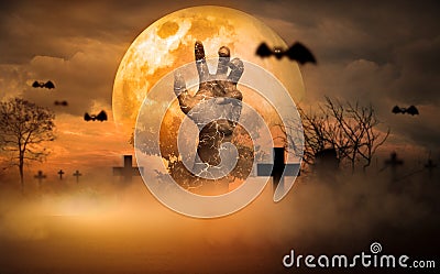 Halloween Concept Horror, night with resurrected zombie hands popping out of hell With moon floating in sky, atmosphere in cold Stock Photo