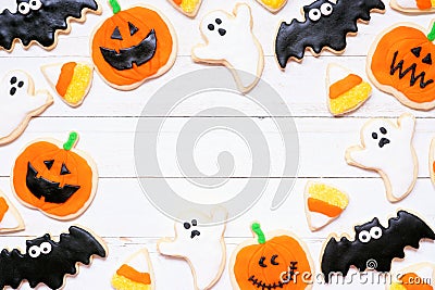 Halloween cookie frame on a white wood background Stock Photo