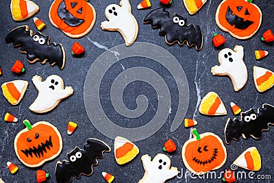 Halloween cookie frame on a dark stone background Stock Photo