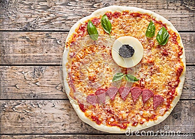 Halloween creative scary food eye cyclops monster zombie face pizza snack with mozzarella Stock Photo