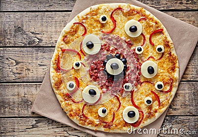Halloween creative scary food monster pizza snack with eyes Stock Photo