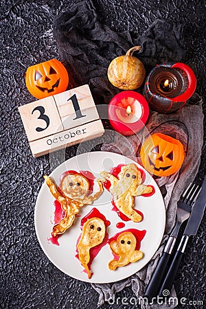 Halloween creative treat ghost pancakes Stock Photo