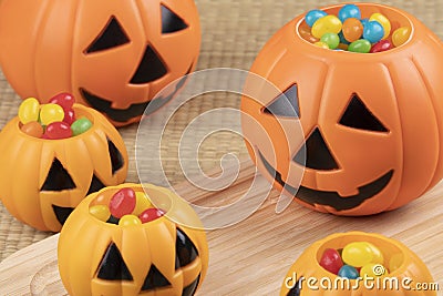 Halloween decorations using plastic pumkins and jelly beans Stock Photo