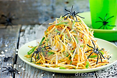 Halloween fun food idea - spooky spider nest salad Stock Photo
