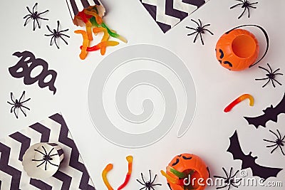 Halloween holiday background with spiders and candy. View from above Stock Photo