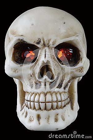 Halloween skull with red glowing eyes. Clipping path Stock Photo