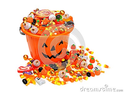 Halloween Jack o Lantern pail overflowing with candy Stock Photo