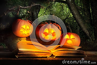 Halloween Jack-O-Lanterns Reading Scary Story Stock Photo