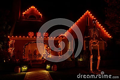 Halloween Jack-o-lanterns and a Skeleton Decorating House in California Stock Photo