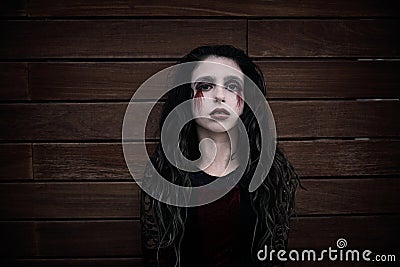 Halloween kid girl custome bloody makeup Stock Photo