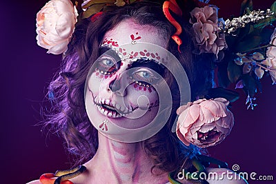 Halloween make up sugar skull beautiful model. Santa Muerte concept. Stock Photo