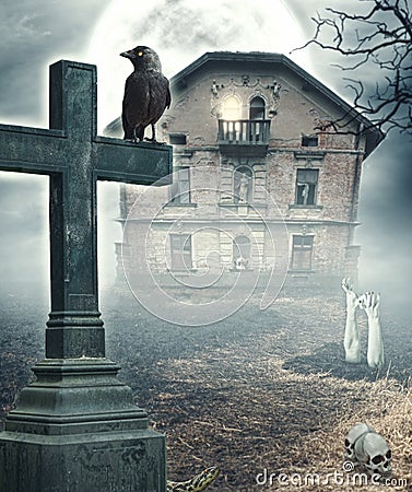 Halloween mystical spooky background with cross and haunted house Stock Photo