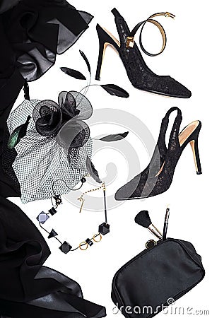 Halloween party female outfit collection accessories black on white background, shoes, cloth with skulls, jewelry, bag Stock Photo